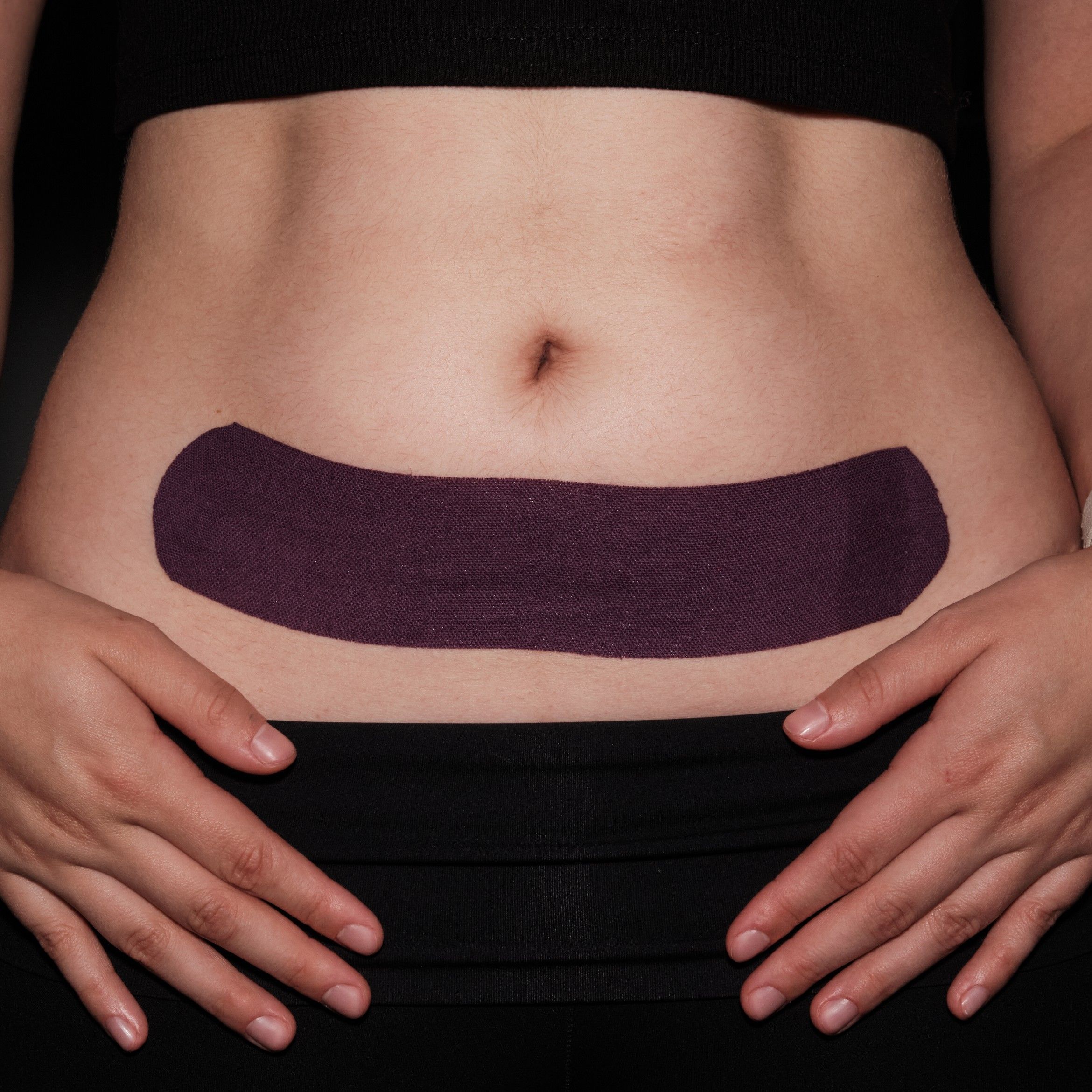 Kinesiotaping brzucha w studiu ALE czary